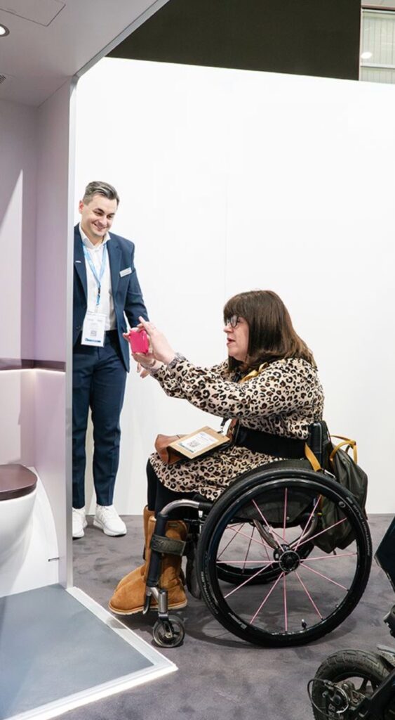 Mary Doyle views the new Space³ concept, which creates an accessible lavatory from two side-by-side lavs
